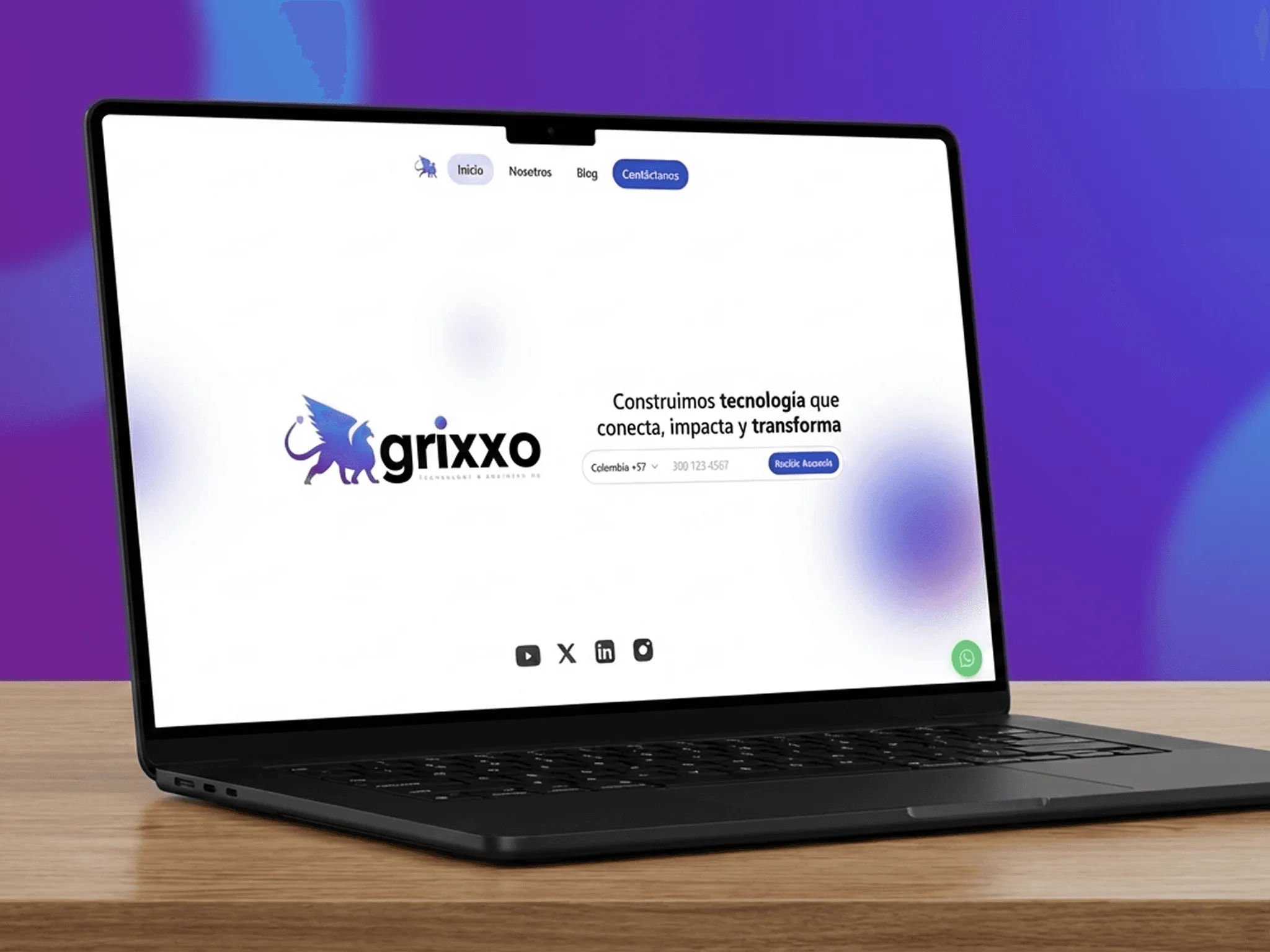 Mockup en portátil de la landing page de Grixxo